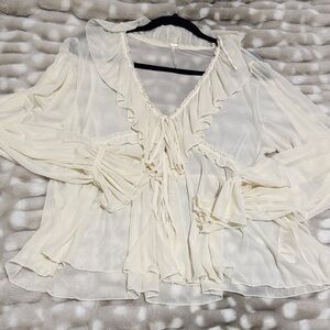 Free people 
Cream Ruffled Women's Top